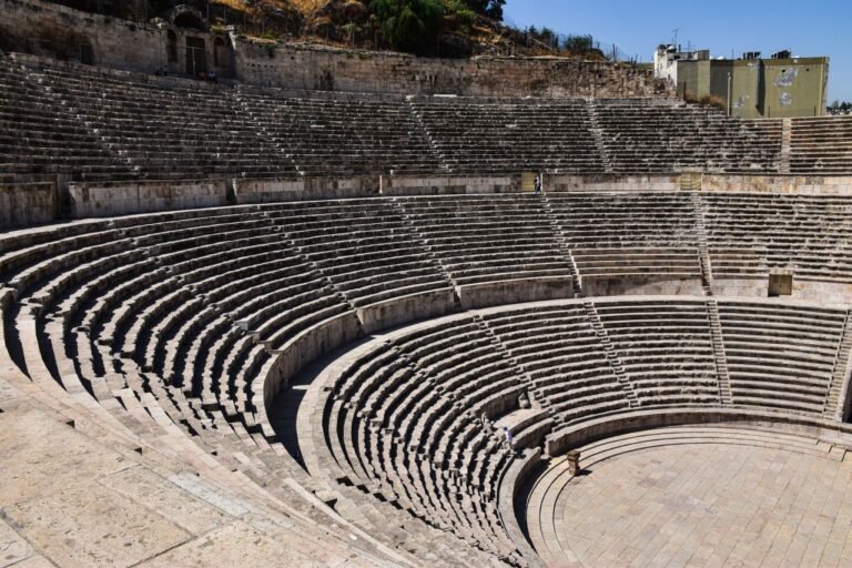 A detailed view of the ancient Roman amphitheater in Amman, showcasing its architectural grandeur.