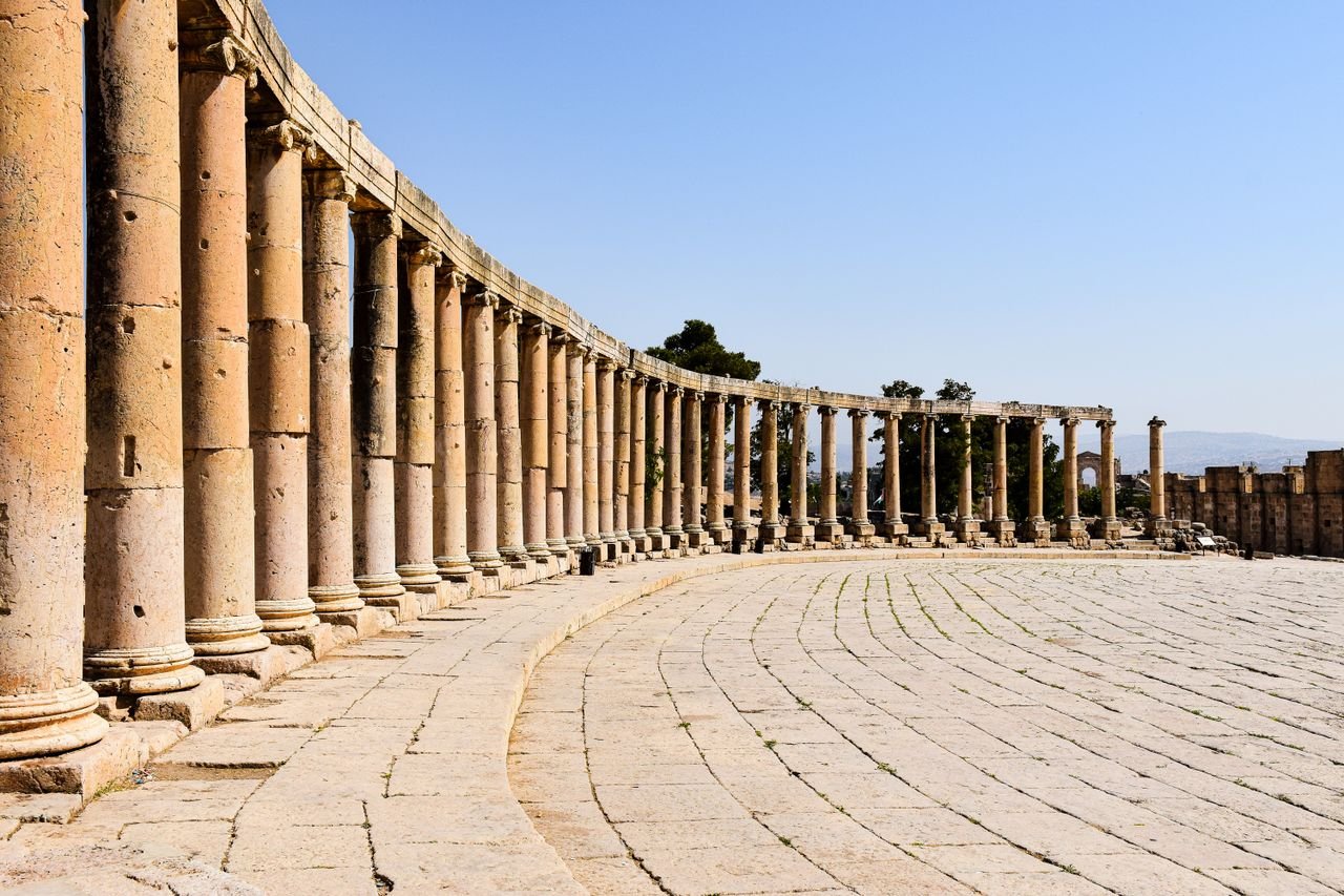 Explore the ancient Roman architecture of Jerash, Jordan, showcasing well-preserved columns and the iconic Oval Plaza.