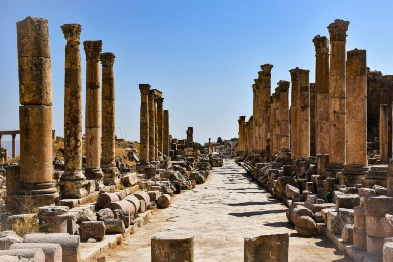 Jerash & Ajloun & Umm Qais Ruins of ancient Roman columns in Jerash, Jordan, showcasing historical architecture.